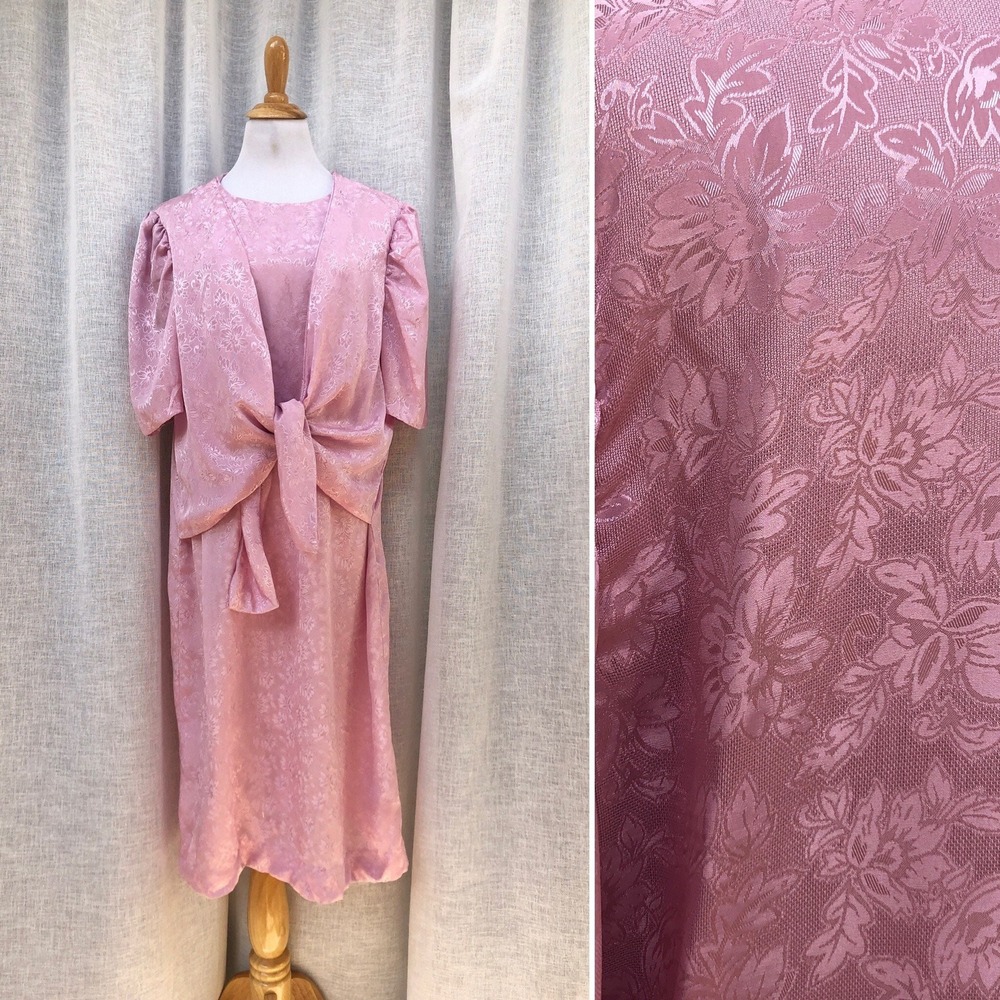 1970's pink wrap top blouson dress in a jacquard weave floral polyester